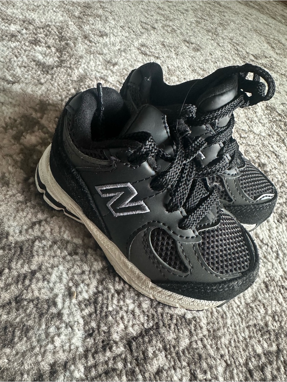 New Balance Black Kids Athletic Sneakers with White Accent